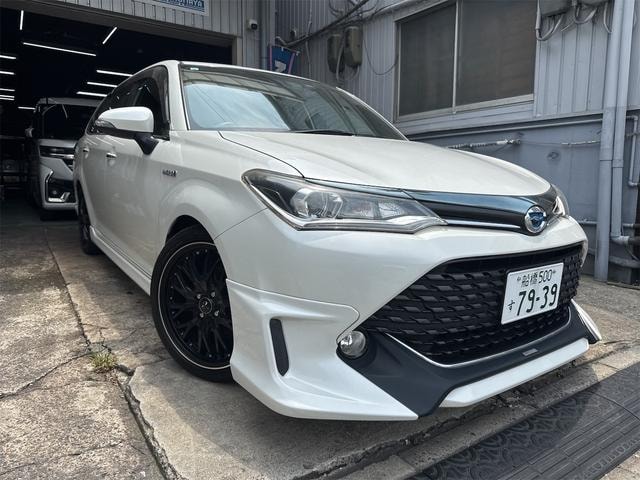 Toyota COROLLA FIELDER 2015 — фото автомобиля