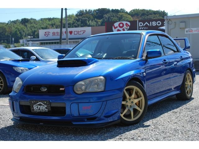 Subaru IMPREZA 2002 — фото автомобиля