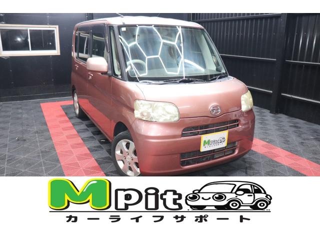 Daihatsu TANTO 2010 — фото автомобиля 1