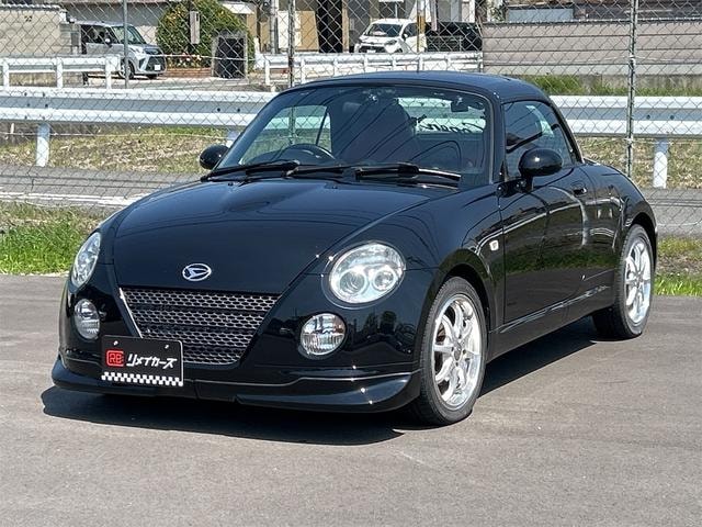 Daihatsu COPEN 2003 — фото автомобиля 1