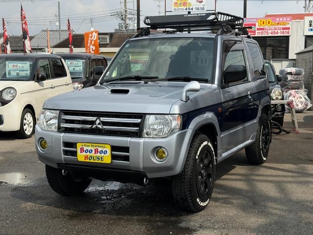 Mitsubishi PAJERO MINI 2012 — фото автомобиля 1