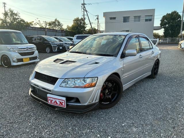 Mitsubishi LANCER 2001 — фото автомобиля 1