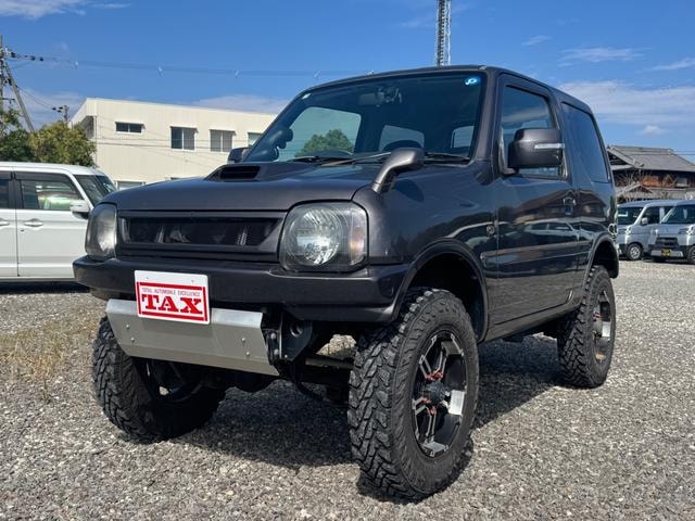 Suzuki JIMNY 2011 — фото автомобиля 1