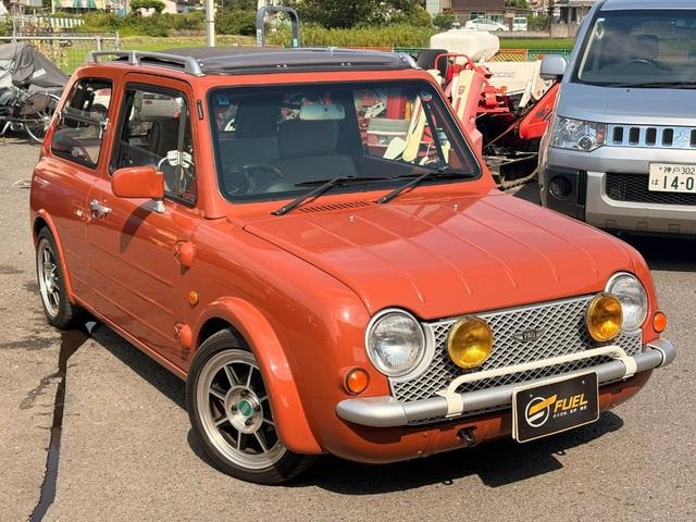 Nissan PAO 1990 — фото автомобиля 1