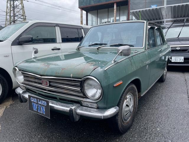 Nissan SUNNY 1970 — фото автомобиля