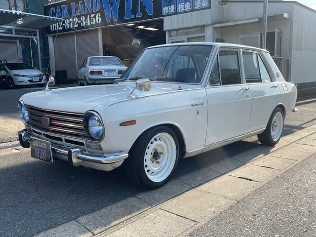 Nissan SUNNY 1969 — фото автомобиля