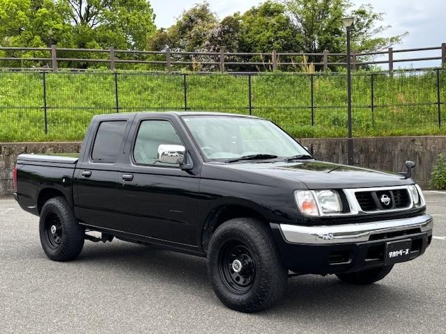 Nissan DATSUN PICK UP 1999 — фото автомобиля 1