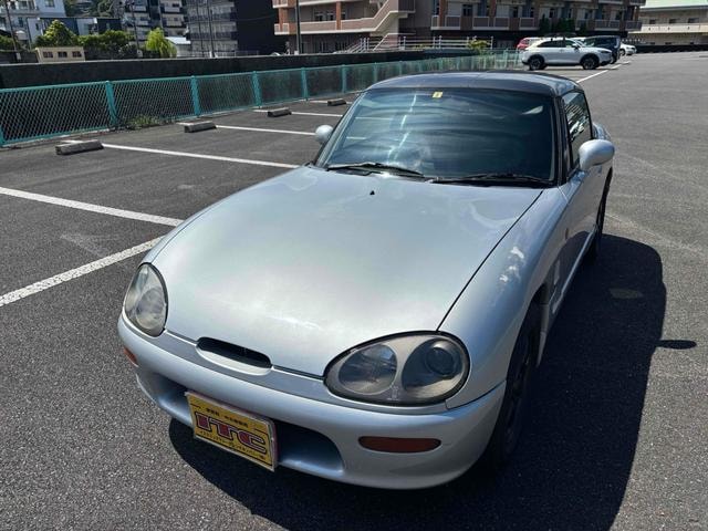 Suzuki CAPPUCCINO 1997 — фото автомобиля