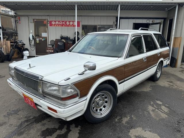 Nissan CEDRIC WAGON 1997 — фото автомобиля