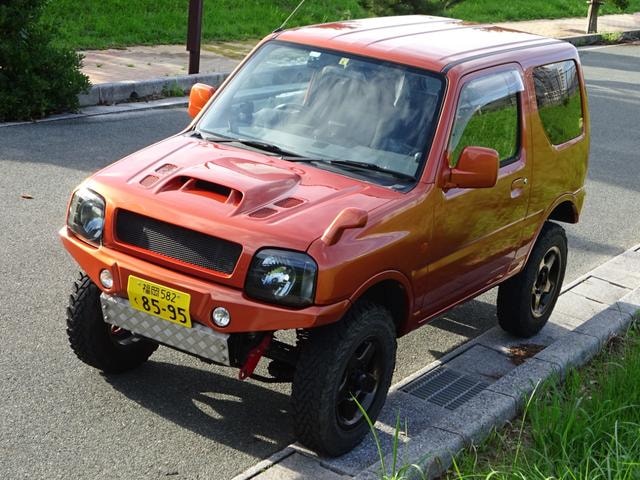 Suzuki JIMNY 2001 — фото автомобиля 1