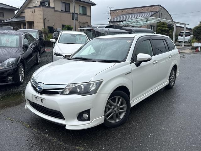 Toyota COROLLA FIELDER 2015 — фото автомобиля 1