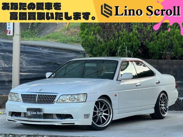 Nissan LAUREL 1998 — фото автомобиля 1