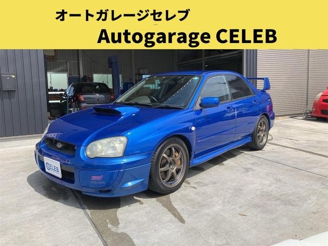 Subaru IMPREZA 2002 — фото автомобиля