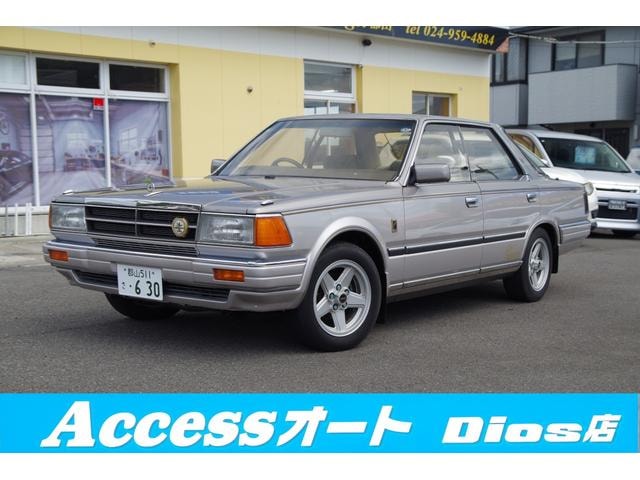 Nissan GLORIA 1984 — фото автомобиля 1