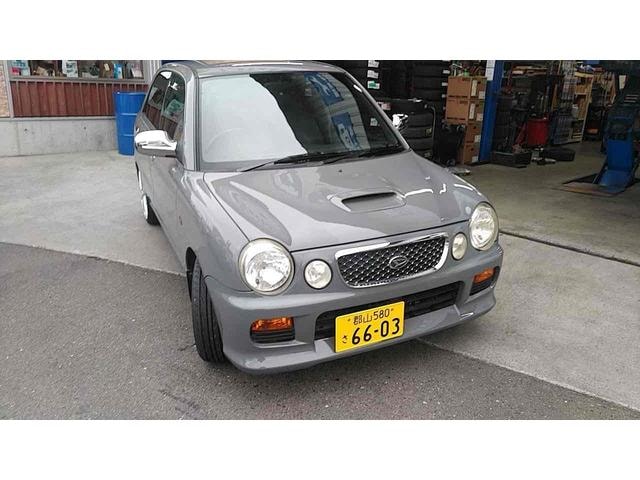 Daihatsu OPTI 2001 — фото автомобиля 1