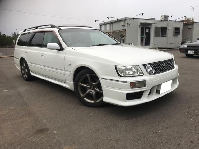 Nissan STAGEA 2001 — фото автомобиля 1