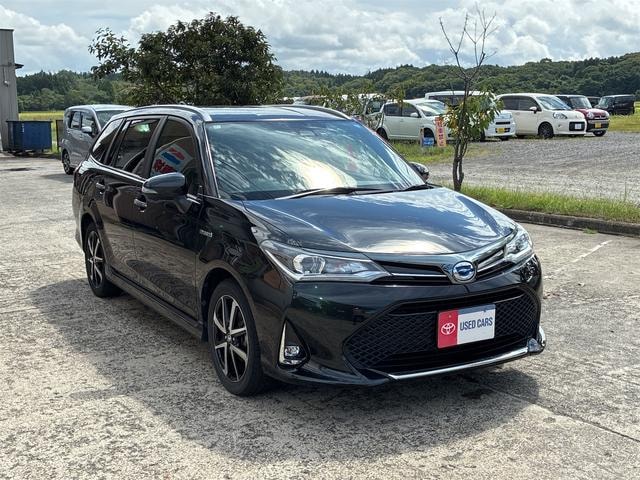 Toyota COROLLA FIELDER 2018 — фото автомобиля 1