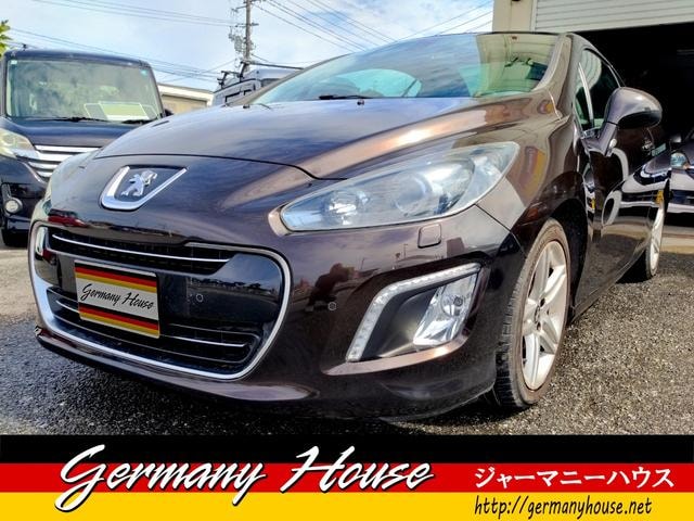 Peugeot 308 2013 — фото автомобиля 1