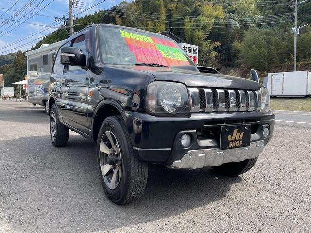 Suzuki JIMNY 2011 — фото автомобиля 1