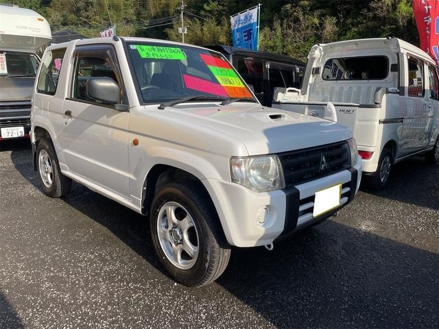 Mitsubishi PAJERO MINI 2012 — фото автомобиля 1