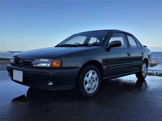 Nissan PRIMERA 1993 — фото автомобиля 1
