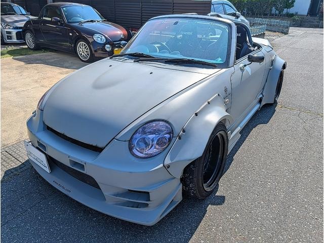 Daihatsu COPEN 2004 — фото автомобиля 1