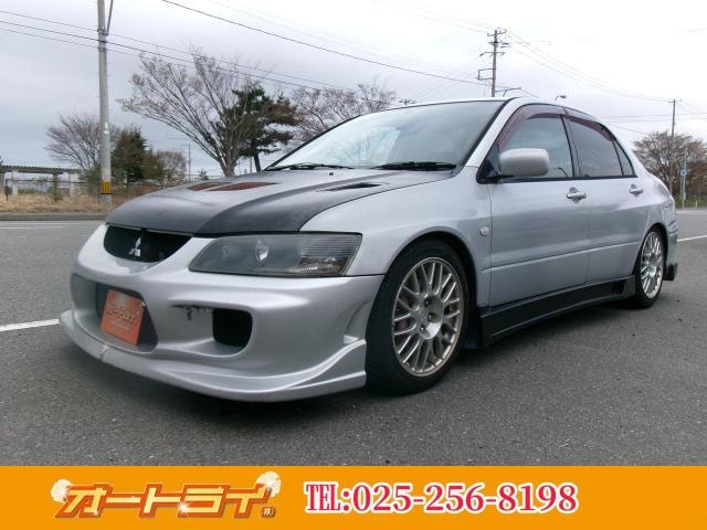 Mitsubishi LANCER 2001 — фото автомобиля 1