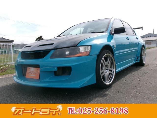 Mitsubishi LANCER 2003 — фото автомобиля 1
