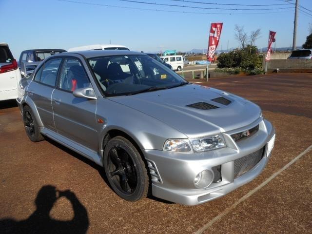 Mitsubishi LANCER 1999 — фото автомобиля 1