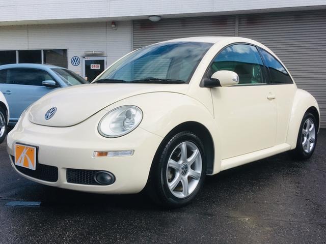 Volkswagen NEW BEETLE 2010 — фото автомобиля