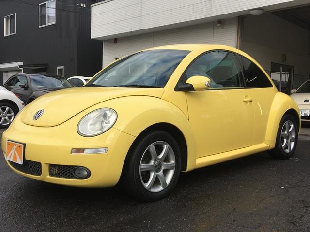 Volkswagen NEW BEETLE 2010 — фото автомобиля