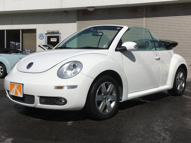 Volkswagen NEW BEETLE CABRIOLET 2010 — фото автомобиля 1