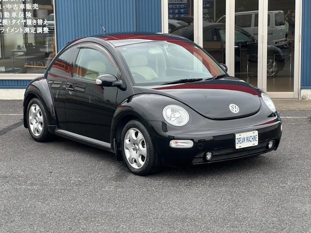 Volkswagen NEW BEETLE 2003 — фото автомобиля