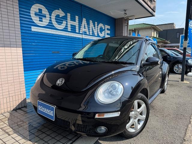 Volkswagen NEW BEETLE 2010 — фото автомобиля