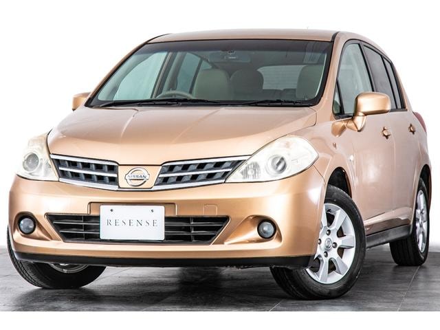 Nissan TIIDA 2010 — фото автомобиля 1