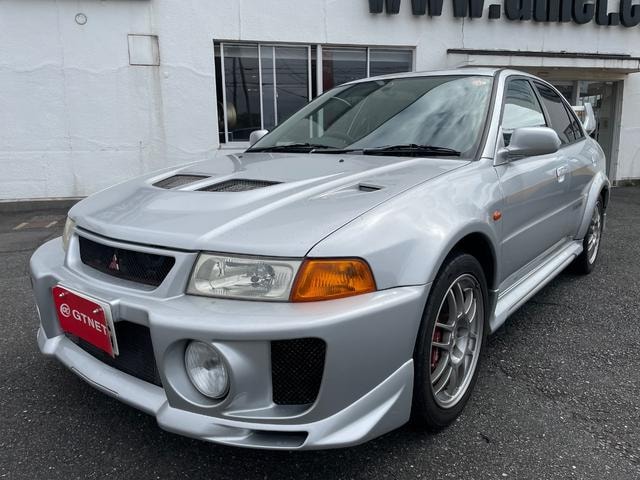 Mitsubishi LANCER 1998 — фото автомобиля 1