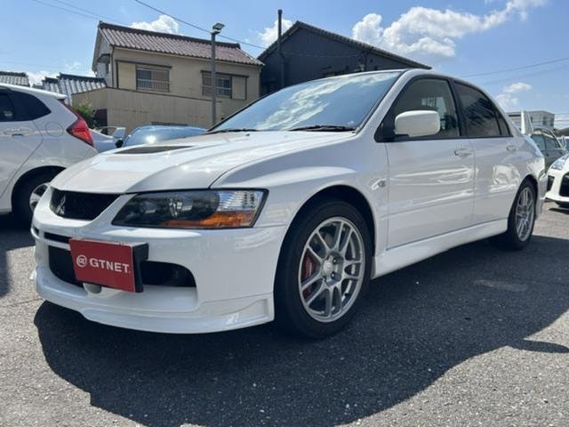 Mitsubishi LANCER 2006 — фото автомобиля 1