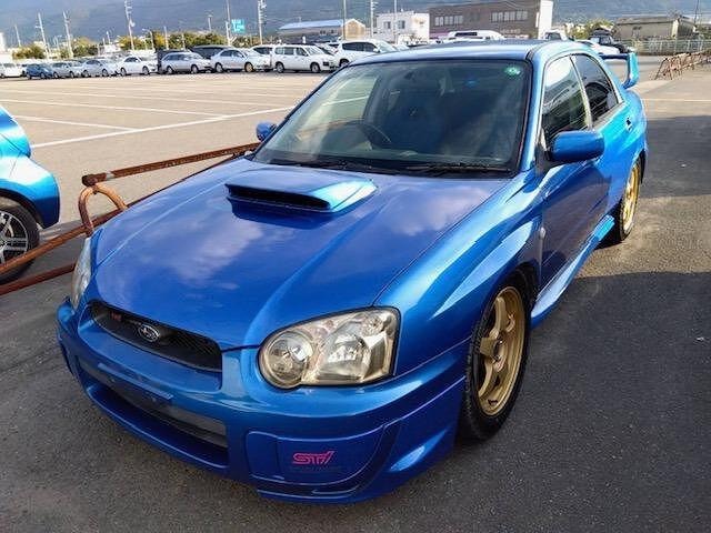 Subaru IMPREZA 2002 — фото автомобиля