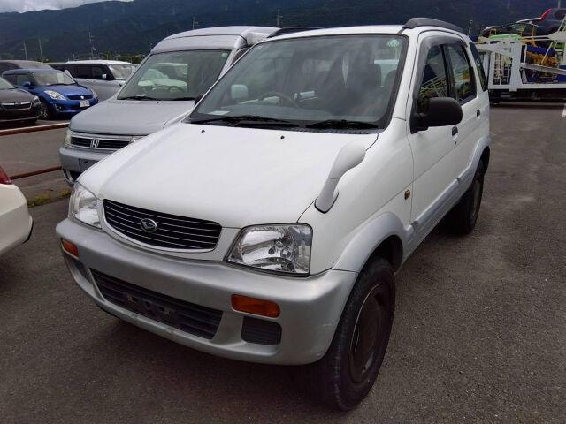 Daihatsu TERIOS 1999 — фото автомобиля