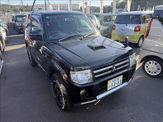 Mitsubishi PAJERO MINI 2011 — фото автомобиля 1